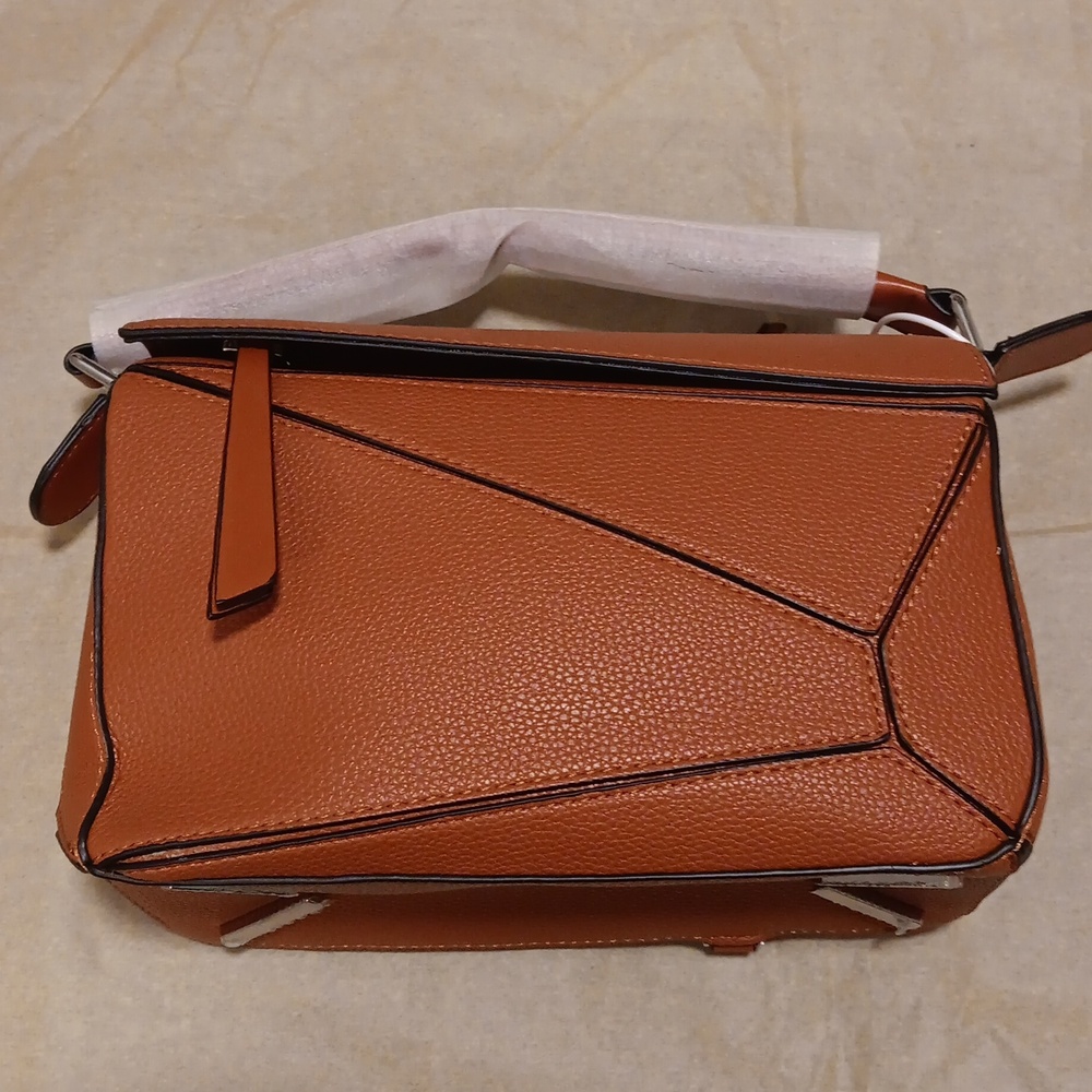 Handbag with top handle